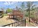 Backyard featuring a wooden deck with wooded view at 147 Amber Woods Dr, Tega Cay, SC 29708