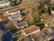 Aerial view of a residential street showing the property and neighborhood trees with close proximity to neighborhood amenities at 1509 Harrill St, Charlotte, NC 28205