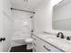 Modern bathroom featuring marble-look shower and vanity at 1509 Harrill St, Charlotte, NC 28205