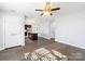 Open-concept living space featuring hardwood floors and a view into the kitchen island at 1509 Harrill St, Charlotte, NC 28205