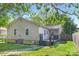 Back exterior featuring a cozy deck, and a fenced-in yard, perfect for outdoor activities and relaxation at 1509 Harrill St, Charlotte, NC 28205
