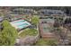 Aerial view of tennis court and pool within community at 16312 Redstone Mountain Ln, Charlotte, NC 28277