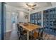 A large dining room table and hardwood floors make this dining room suitable for all at 1815 W Sugar Creek Rd, Charlotte, NC 28262