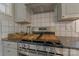 Stainless steel oven and hood, along with white tiling, makes this kitchen a home at 1815 W Sugar Creek Rd, Charlotte, NC 28262