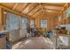 Inside shed with wooden walls, a peaked ceiling, and a potting station at 1815 W Sugar Creek Rd, Charlotte, NC 28262