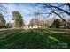 Expansive backyard with mature trees at 1909 Stokes Ferry Rd, Salisbury, NC 28146