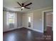 Bedroom featuring hardwood floors, neutral walls, and natural light at 1909 Stokes Ferry Rd, Salisbury, NC 28146