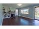 Bright living room with hardwood floors, a fireplace, and a large window at 1909 Stokes Ferry Rd, Salisbury, NC 28146