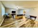 Spacious living room featuring wood-look floors and neutral paint at 207 Sigmon Rd, Statesville, NC 28677