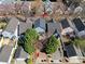 Aerial view of a gray home nestled in a suburban neighborhood at 232 Faust Rd, Davidson, NC 28036