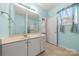 Charming bathroom with vanity cabinet and blue painted walls at 232 Faust Rd, Davidson, NC 28036