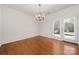 Bright dining room featuring hardwood floors and French doors to the outside at 232 Faust Rd, Davidson, NC 28036