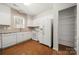 Efficient kitchen with white appliances, great cabinet space and pantry at 232 Faust Rd, Davidson, NC 28036