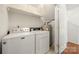 Well-lit laundry area with modern machines and convenient storage space at 232 Faust Rd, Davidson, NC 28036