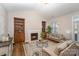 Comfortable living room features built-in shelving, a fireplace and neutral furnishings at 4108 Twenty Grand Dr, Indian Trail, NC 28079