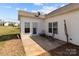 Backyard patio for outdoor seating with a view of the spacious lawn at 420 Spring Arbor Ave # 80, Salisbury, NC 28146