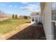 Backyard patio for outdoor seating with a view of the spacious lawn at 420 Spring Arbor Ave # 80, Salisbury, NC 28146