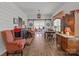 Open-concept dining area features classic furnishings and hardwood floors with adjacent seating areas at 420 Spring Arbor Ave # 80, Salisbury, NC 28146