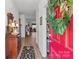 Inviting foyer featuring a vibrant red door and stylish decor, leading into a naturally lit home at 420 Spring Arbor Ave # 80, Salisbury, NC 28146