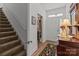 Inviting entryway featuring a staircase and a view into the library, creating a warm welcome at 420 Spring Arbor Ave # 80, Salisbury, NC 28146