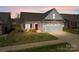 Charming single-Gathering home with stone accents, a red door, and an attached two-car garage at 420 Spring Arbor Ave # 80, Salisbury, NC 28146