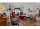 Inviting living room featuring classic furnishings, hardwood floors, and an abundance of natural light at 420 Spring Arbor Ave # 80, Salisbury, NC 28146