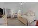 Elegant main bedroom features a comfortable bed, dresser, and vanity with ample natural light at 420 Spring Arbor Ave # 80, Salisbury, NC 28146