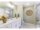 Stylish bathroom featuring a large countertop, sleek white cabinets, and modern fixtures at 4223 Black Ct # 195, Harrisburg, NC 28075