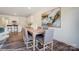 Inviting dining space adjacent to the kitchen, highlighted by modern decor and comfortable seating at 4235 Black Ct # 197, Harrisburg, NC 28075