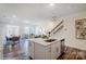 Open concept featuring a modern kitchen island and a view of the living area at 4235 Black Ct # 197, Harrisburg, NC 28075