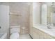 Bathroom with white fixtures, tile floor and vanity with built in storage cabinet at 4309 Woodglen Ln, Charlotte, NC 28226