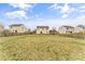 Spacious backyard featuring green grass and a wood fence at 4496 Springs Rd, Conover, NC 28613