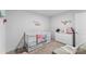 Bright Bedroom room featuring a crib, changing table and dresser with white paint at 4496 Springs Rd, Conover, NC 28613