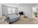 Bright bedroom featuring carpet, a comfortable bed, and natural light from windows at 4496 Springs Rd, Conover, NC 28613