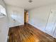 Cozy bedroom featuring bright light and hardwood floors at 4801 Kipling Dr, Charlotte, NC 28212