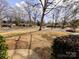 View of neighborhood with mature trees and ranch homes at 4801 Kipling Dr, Charlotte, NC 28212