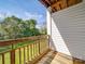 Cozy back porch offers a relaxing outdoor space with views of the lush green yard at 6724 Mallard Park Dr, Charlotte, NC 28262