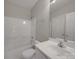 Bathroom featuring tub/shower, toilet and large mirror over vanity at 6724 Mallard Park Dr, Charlotte, NC 28262