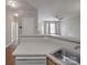 Well-lit kitchen featuring laminate countertops, flowing into the adjacent living space with ample natural light at 6724 Mallard Park Dr, Charlotte, NC 28262