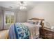 Bedroom with a carpet, window with curtains, and decorated with calm colors at 7025 Ridgeway Rd, Stanley, NC 28164