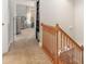 Upstairs hallway featuring carpeted floors and a clear view into the bedroom at 7025 Ridgeway Rd, Stanley, NC 28164