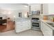 Modern kitchen featuring granite countertops and stainless steel appliances at 800 Water Wheel Ct, Charlotte, NC 28209