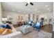 Inviting living room featuring stylish furnishings, a ceiling fan, and an open view to the kitchen at 8637 Miles Gap Rd, Indian Land, SC 29707