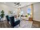 Bright living room with modern furnishings, area rug, and plenty of natural light at 8639 Miles Gap Rd, Indian Land, SC 29707