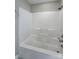 Bathtub-shower combo with built-in shelves at 9530 Driftwood Ct, Hickory, NC 28601