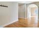 Inviting hallway features hardwood floors and archway leading to the living room at 9530 Driftwood Ct, Hickory, NC 28601