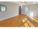 Hardwood floors and trey ceiling in a well lit living room at 9530 Driftwood Ct, Hickory, NC 28601