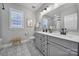 Stylish bathroom featuring a double vanity and decorative tile flooring at 9762 Verdun Ct, Indian Land, SC 29707