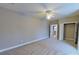 Spacious bedroom offering neutral walls, carpet flooring, closet space, and a ceiling fan at 1007 Equipoise Dr, Indian Trail, NC 28079