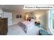 Bedroom with a basketball theme featuring a decorative wall at 1037 Merganser Way, Indian Trail, NC 28079